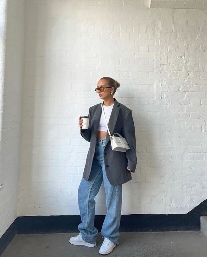 Grey Oversized Blazer + White Cropped Tank + Baggy Light-Wash Jeans + White Sneakers + White Crossbody Bag
