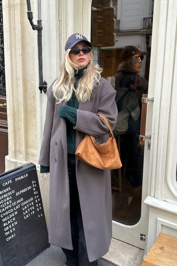 Grey Oversized Coat + Dark Green Turtleneck + Black Pants + Brown Suede Shoulder Bag + Navy Cap