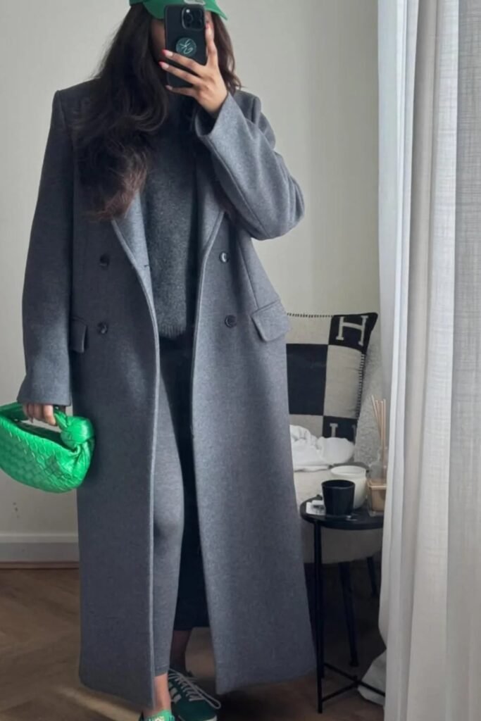 Grey Sweater + Long Grey Coat + Black Pants + Green Sneakers + Green Cap + Green Woven Handbag