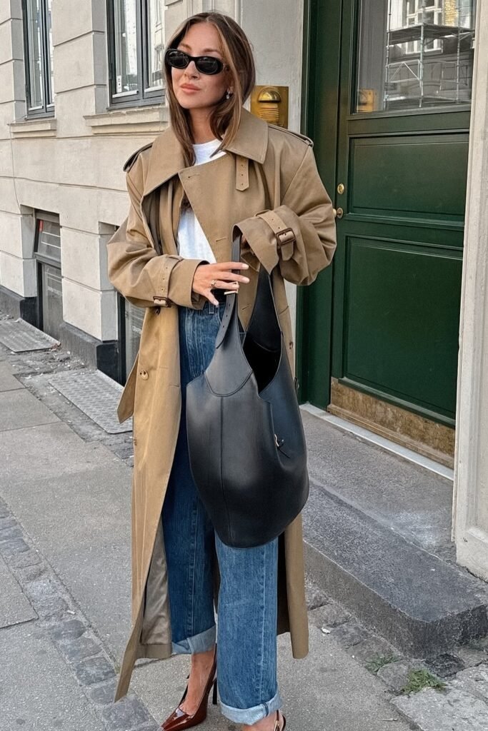 Beige Trench Coat + White T-shirt + Blue Jeans + Black Purse
