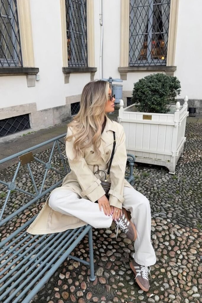 Beige Trench Coat + White Wide-Leg Trousers + Brown Sneakers