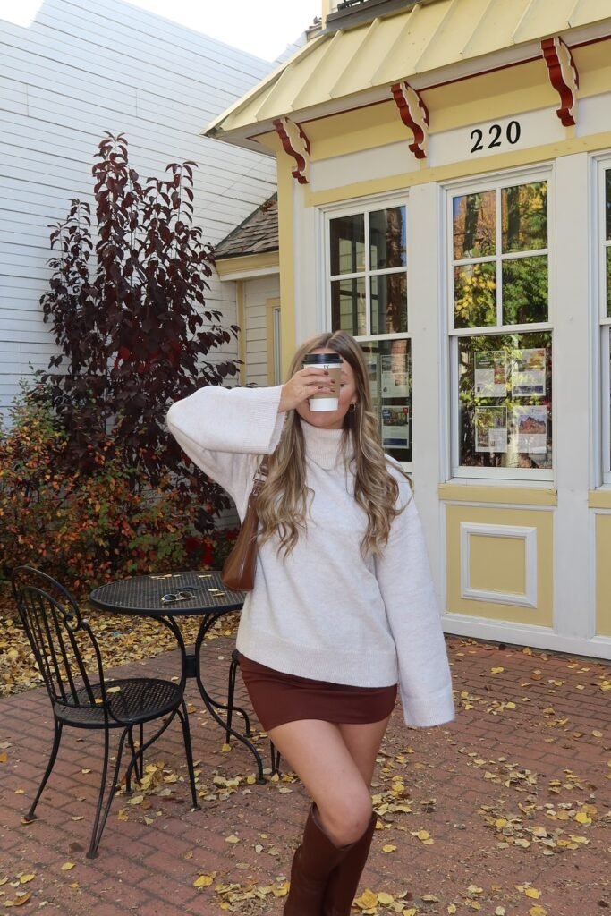 Cream Oversized Sweater + Rust Mini Skirt + Brown Knee-High Boots