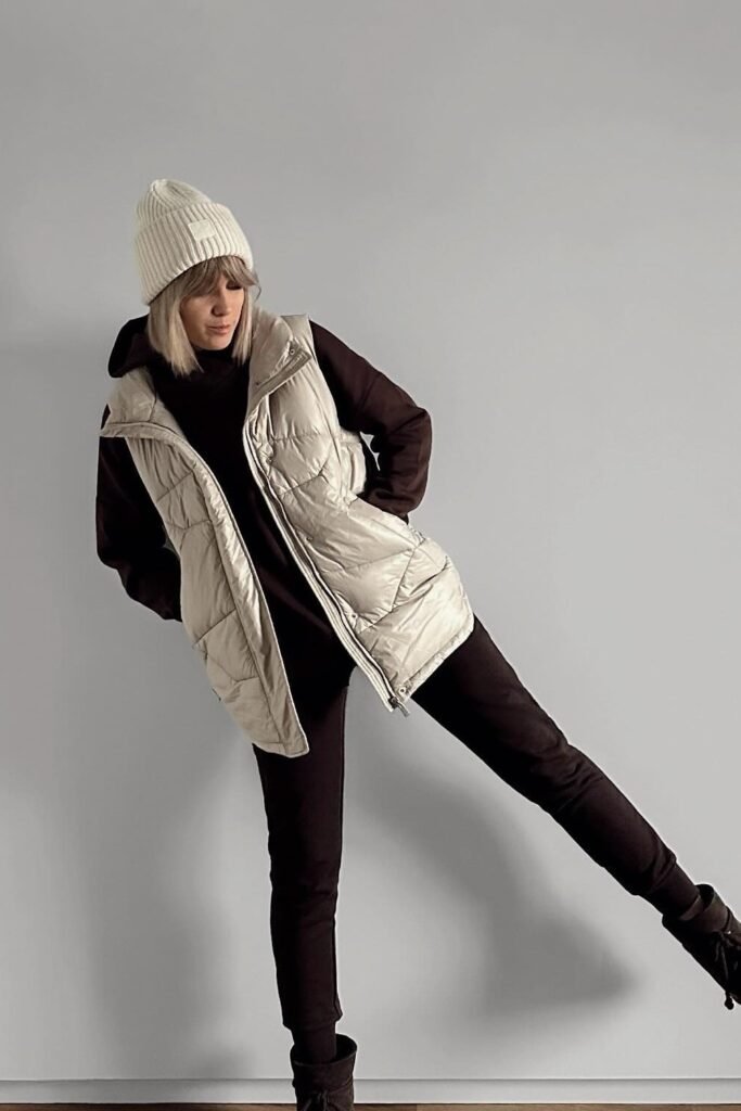 Dark Brown Sweatshirt + Dark Brown Joggers + Beige Puffer Vest + White Beanie + Brown Winter Boots