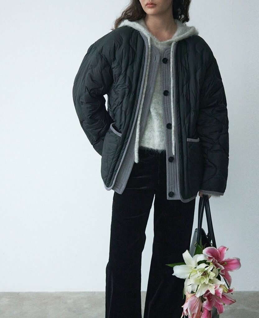 Black Quilted Jacket + Grey Hoodie Cardigan + White Fuzzy Sweater + Black Trousers + Black Tote Bag