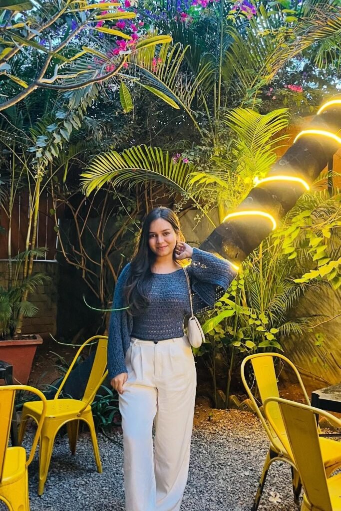 Blue Crochet Sweater + White Pleated Wide-Leg Pants + White Mini Shoulder Bag