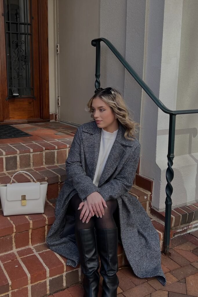 Grey Herringbone Long Coat + White Sweater + Black Sheer Tights + Black Knee-High Boots + White Structured Handbag