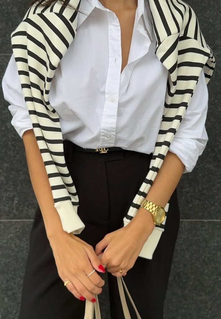 White Button-Down Shirt + Black Tailored Trousers + Striped Sweater