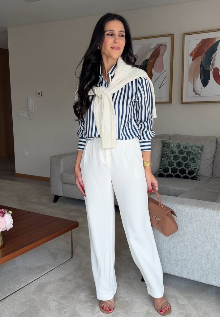 Navy Striped Shirt + White High-Waisted Trousers + Cream Knit Sweater