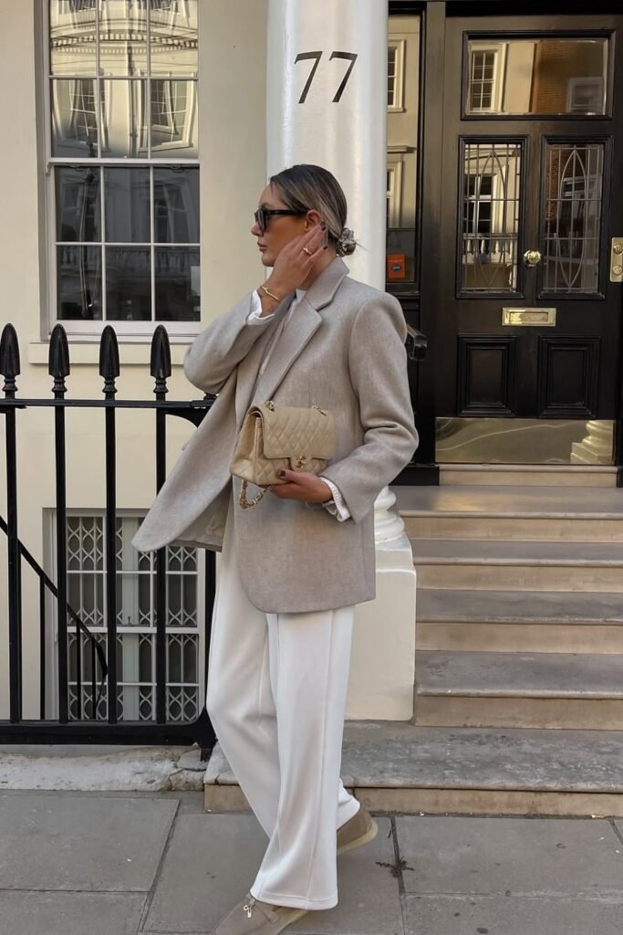 Light Beige Oversized Blazer + White Trousers + White Top + Beige Chanel Flap Bag + Taupe Loafers