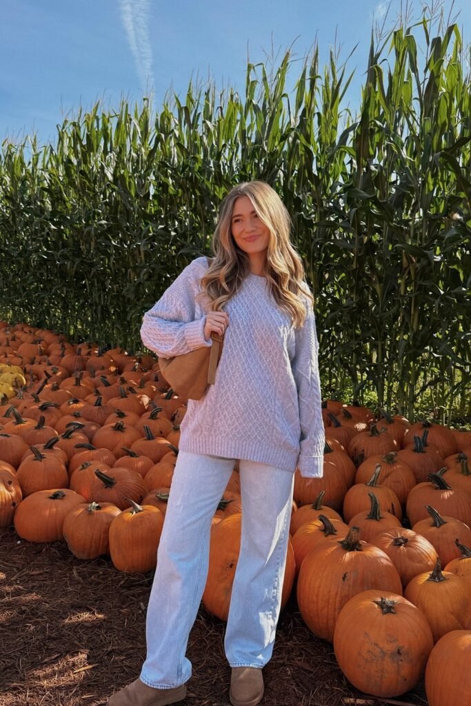 Light Grey Oversized Cable Knit Sweater + Light Wash Straight-Leg Jeans + Chestnut UGG Boots + Camel Shoulder Bag