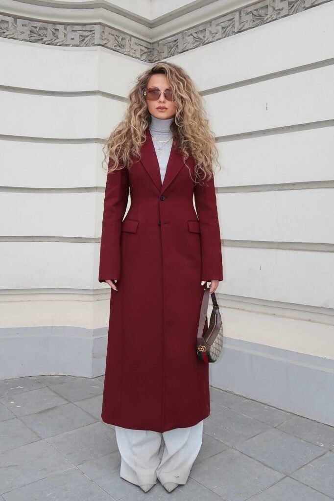 Long Burgundy Wool Coat + Grey Turtleneck + Light Grey Wide-Leg Trousers + Pointed-Toe Heels