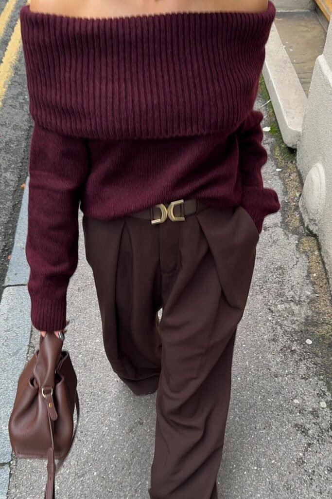 Off-Shoulder Burgundy Knit Sweater + Wide-Leg Brown Pleated Trousers + Brown Leather Bag