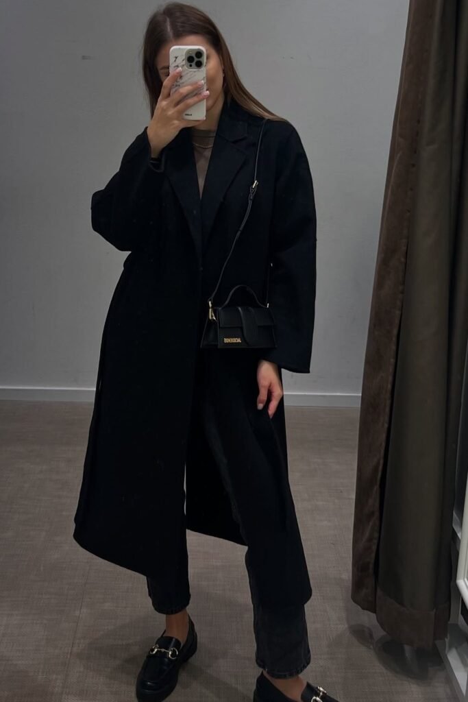 Oversized Black Coat + Black Straight Pants + Black Loafers + Mini Black Handbag
