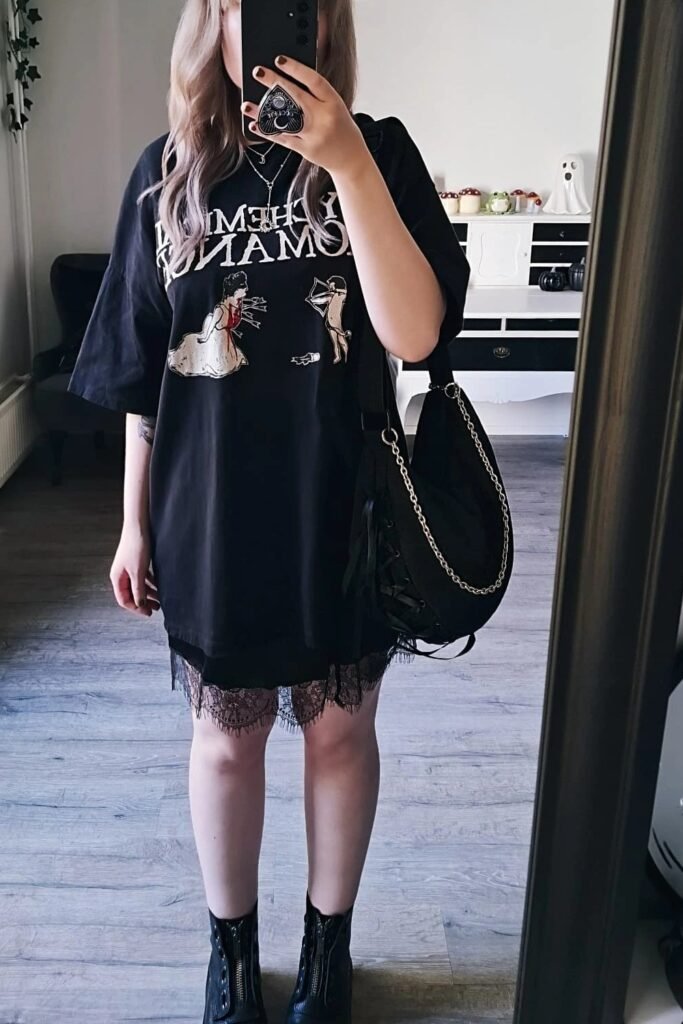 Oversized Black Graphic T-shirt Dress with Lace Hem + Black Mini Shoulder Bag + Black Lace-Up Ankle Boots