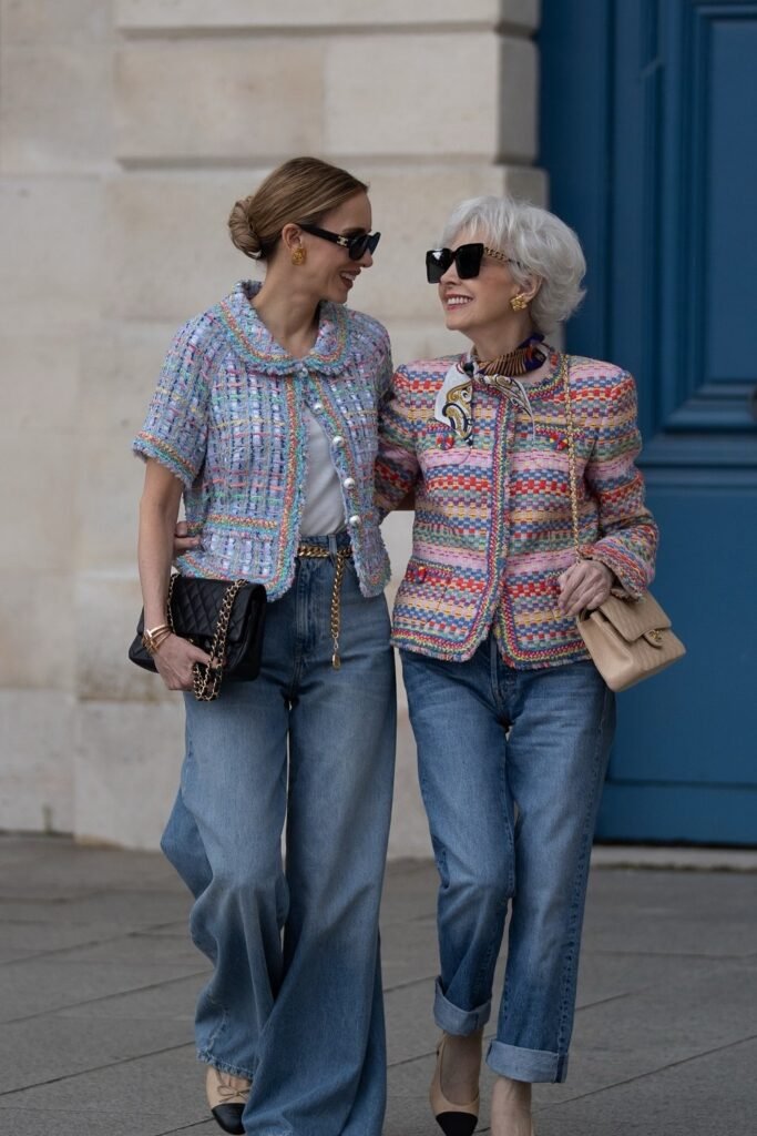 Pastel Multicolor Tweed Jacket + White Top + Wide-Leg Jeans + Black Quilted Bag (paired with Pastel Multicolor Tweed Jacket + Rolled-Up Jeans + Beige Quilted Bag + Patterned Neck Scarf)