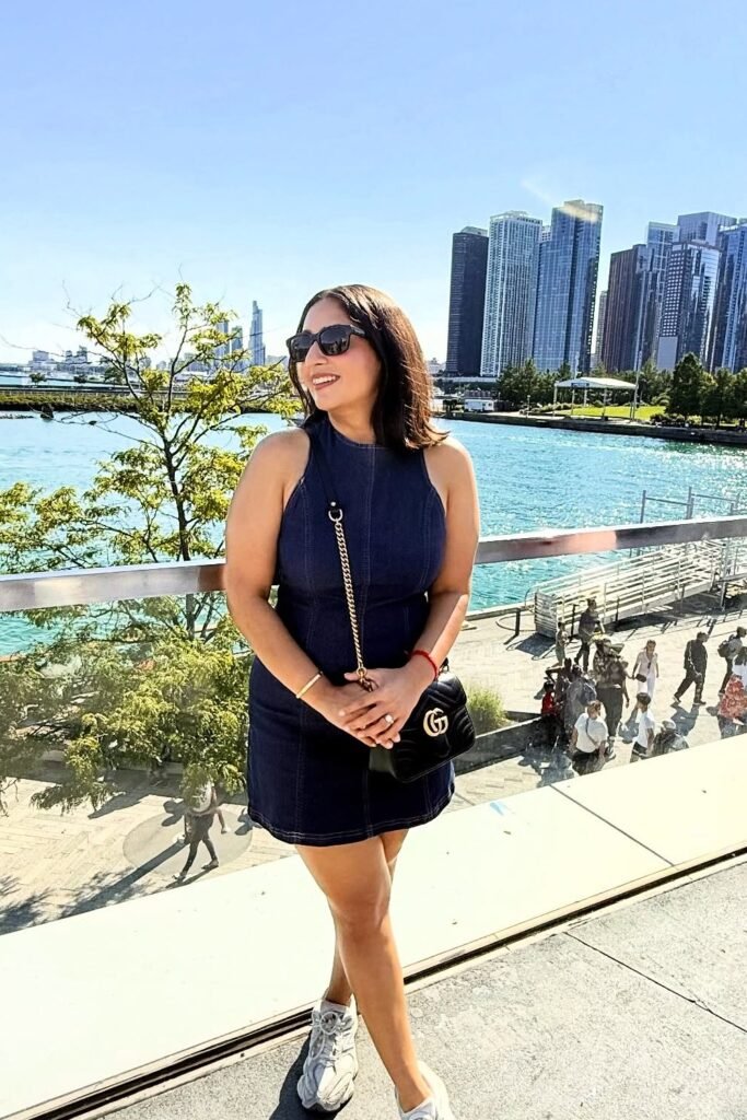 Sleeveless Denim Mini Dress + White Sneakers + Gucci Crossbody Bag