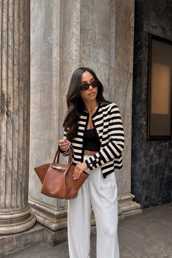 Striped Cardigan + Black Top + White Wide-leg Pants + Brown Handbag