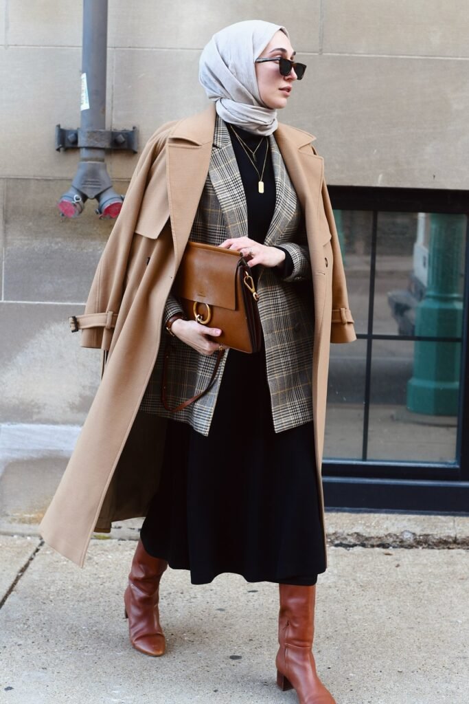 Tan Trench Coat + Plaid Blazer + Black Midi Skirt + Cognac Leather Boots