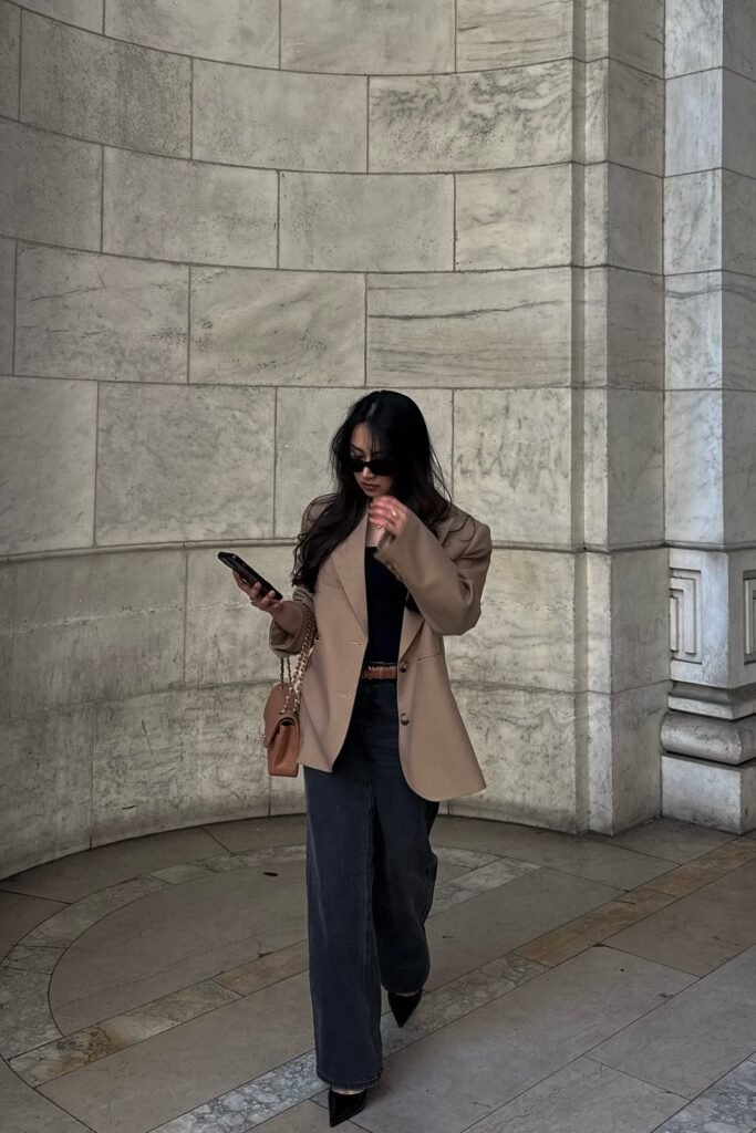 Taupe Blazer + Black Tank Top + Charcoal Wide-Leg Jeans + Pointed Heels + Brown Belt + Tan Chain-Shoulder Bag