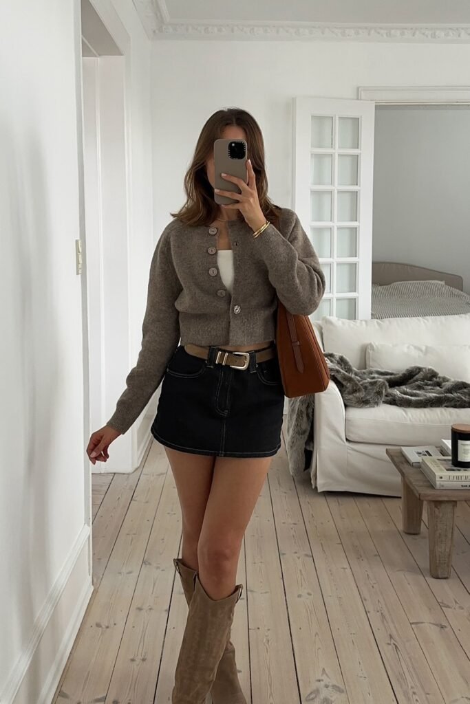 Taupe Cardigan + White Crop Top + Black Denim Mini Skirt + Beige Knee-High Boots