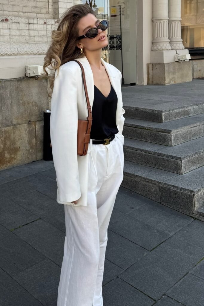 White Blazer + Black Silk Camisole + White Wide-Leg Trousers + Brown Shoulder Bag