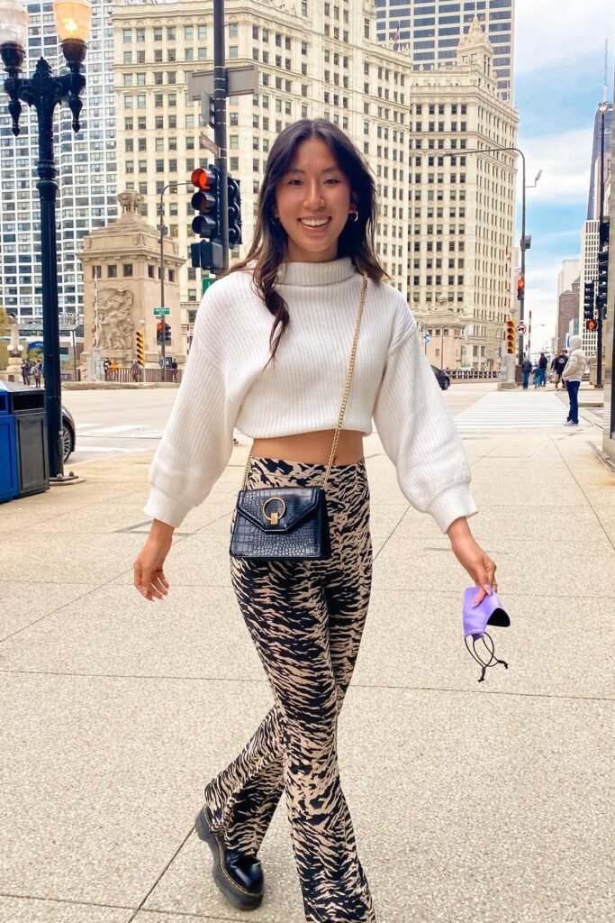 White Cropped Sweater + Animal Print Flared Pants + Black Crossbody Bag + Black Platform Shoes