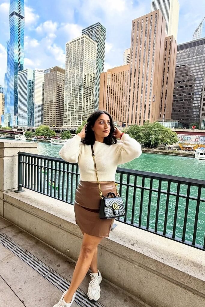 White Cropped Sweater + Brown Leather Mini Skirt + White Sneakers + Gucci Crossbody Bag