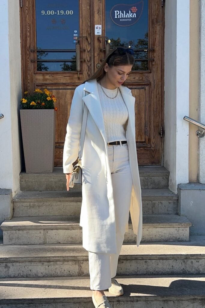 White Long Coat + Cream Cable Knit Sweater + White Straight Pants + Grey Crossbody Bag