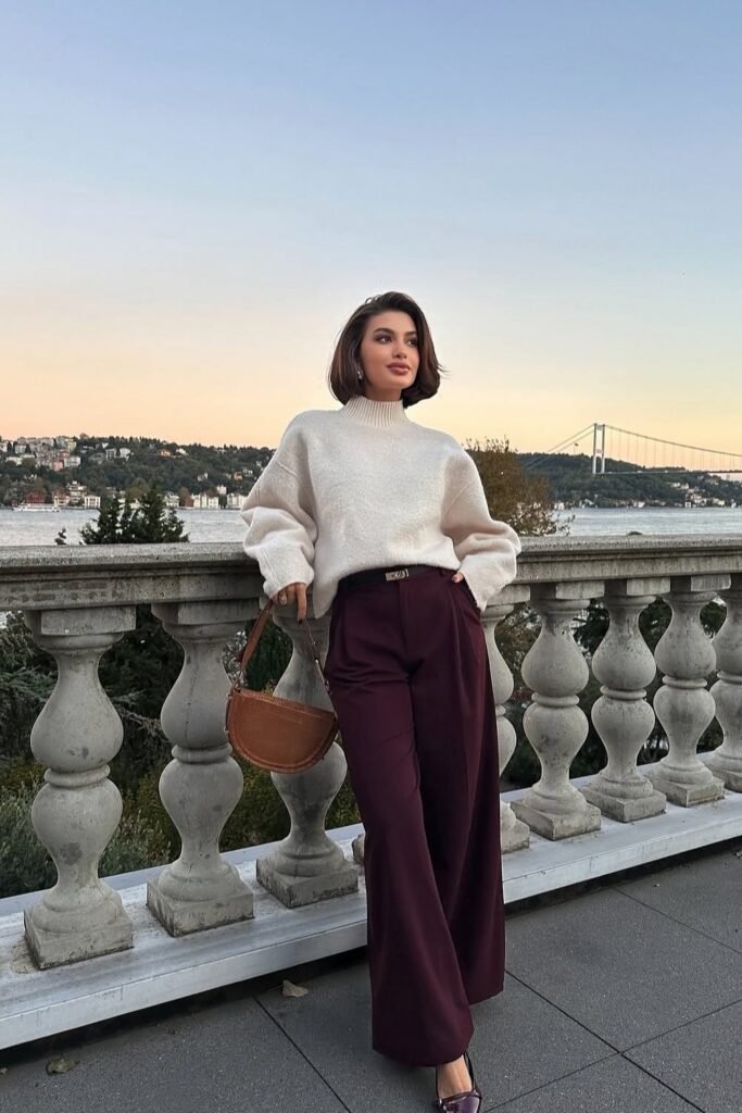 White Oversized Sweater + Burgundy Wide-Leg Trousers + Brown Handbag