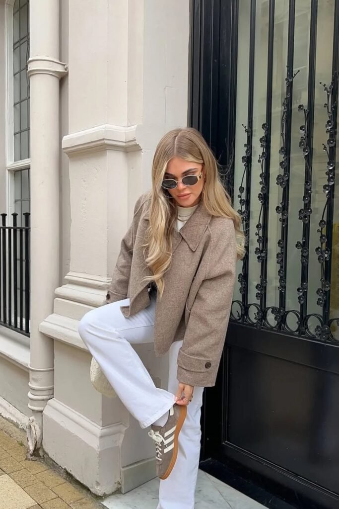 White Tee + Cropped Camel Jacket + White Jeans + Taupe Sneakers + White Quilted Bag + Sunglasses