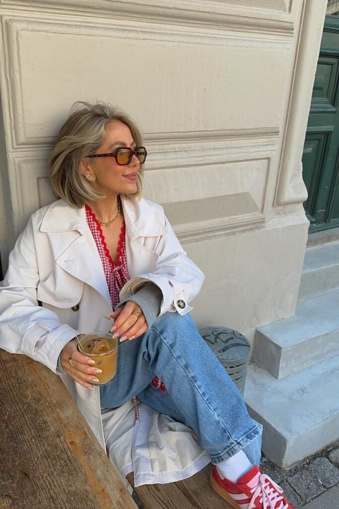 White Trench Coat + Red Gingham Blouse + Blue Jeans + Red Sneakers