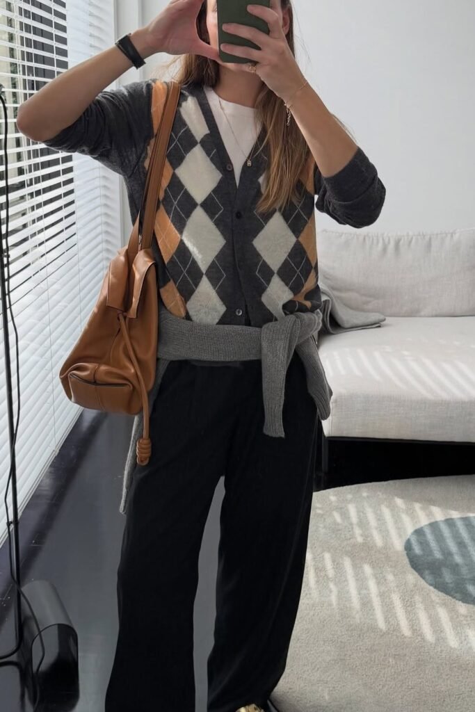 Argyle Cardigan + White T-shirt + Black Wide-Leg Trousers + Tan Drawstring Bag