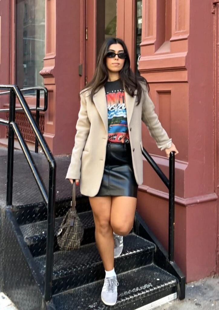 Beige Blazer + Graphic Tee + Black Leather Mini Skirt + White Sneakers