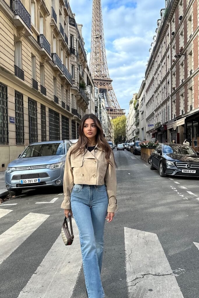 Beige Cropped Trench Jacket + Black Top + Light Blue Straight Jeans + Beige Gucci Bag