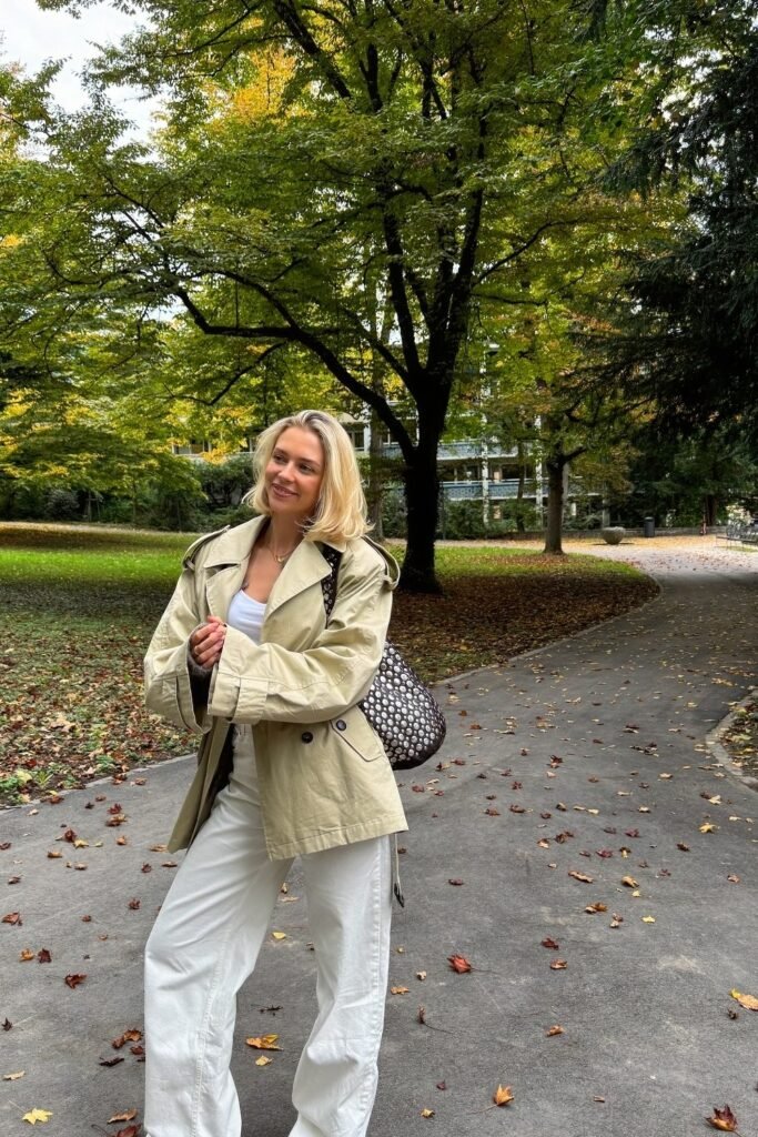 Beige Cropped Trench Jacket + White Tank Top + White Wide-Leg Jeans + Monogram Shoulder Bag