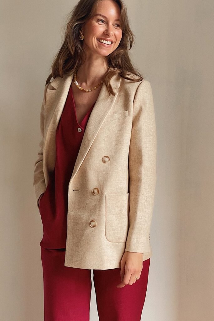 Beige Double-Breasted Blazer + Deep Red Buttoned V-Neck Top + Deep Red Wide-Leg Trousers
