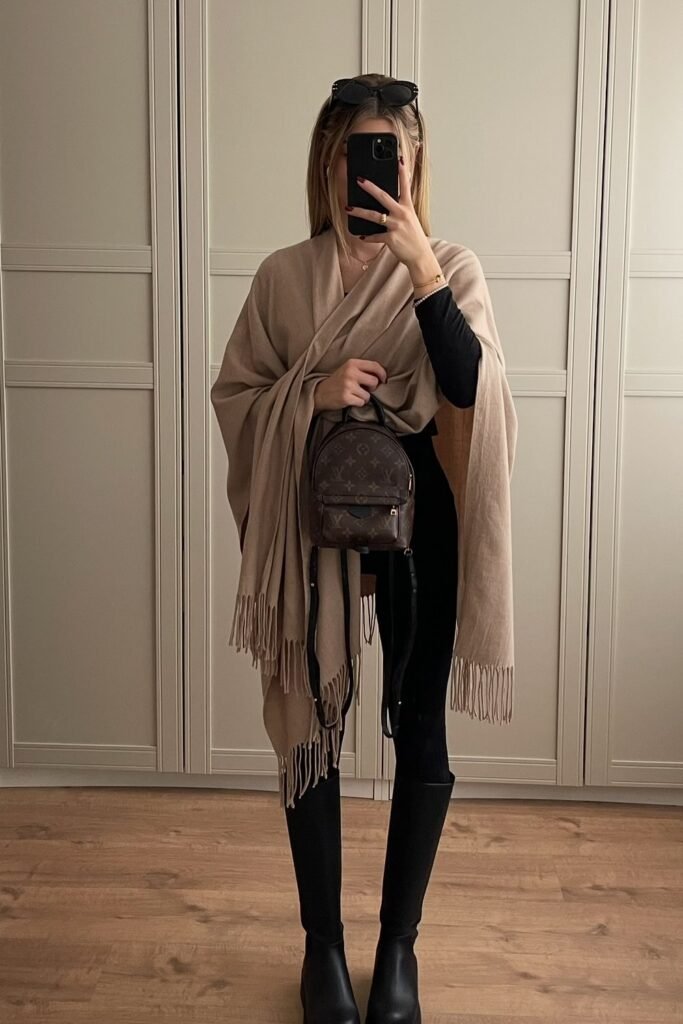 Beige Fringe Blanket Scarf/Shawl + Black Long-Sleeve Top + Black Leggings + Black Knee-High Boots