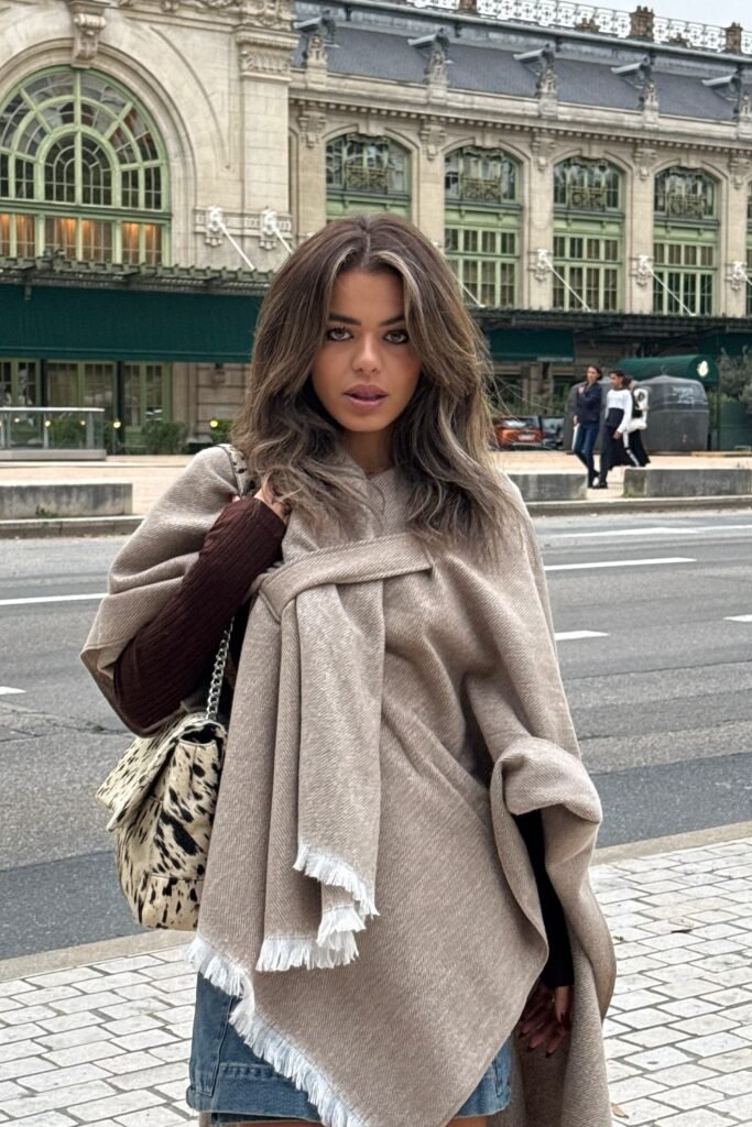 Beige Fringe Poncho + Brown Long-Sleeve Shirt + Denim Mini Skirt