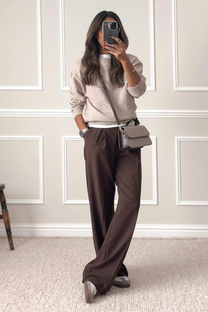 Beige Sweater + Brown Wide-Leg Trousers + White Sneakers + Taupe Crossbody Bag