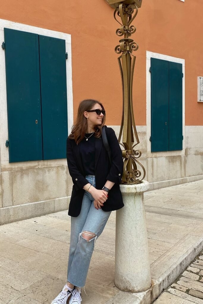 Black Blazer + Black T-Shirt + Light Wash Ripped Jeans + White Sneakers