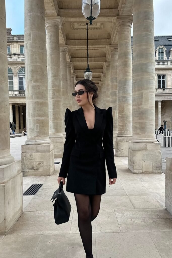 Black Blazer Dress with Structured Shoulders + Sheer Black Tights + Black Heels + Black Structured Bag