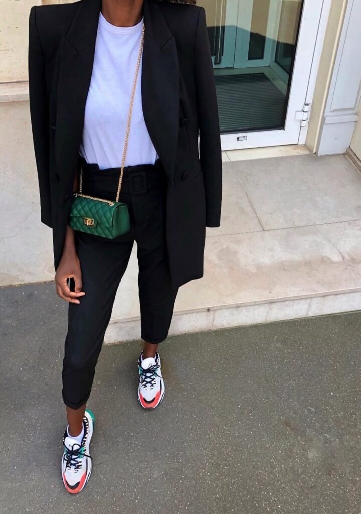 Black Blazer + White T-Shirt + Black Trousers + Chunky Colorful Sneakers + Green Quilted Bag