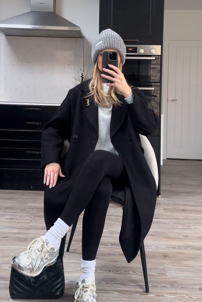 Black Coat + Grey Sweater + Black Leggings + Grey Beanie + Silver/White Sneakers