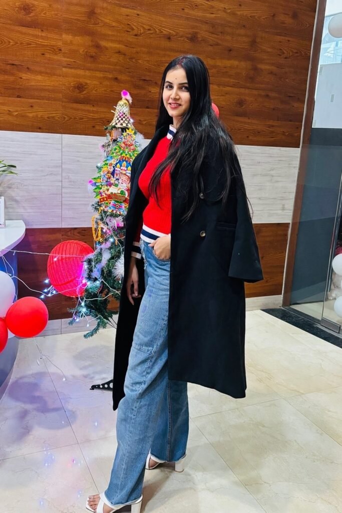 Black Coat + Red & White Sweater + Wide-Leg Jeans + White Heeled Sandals