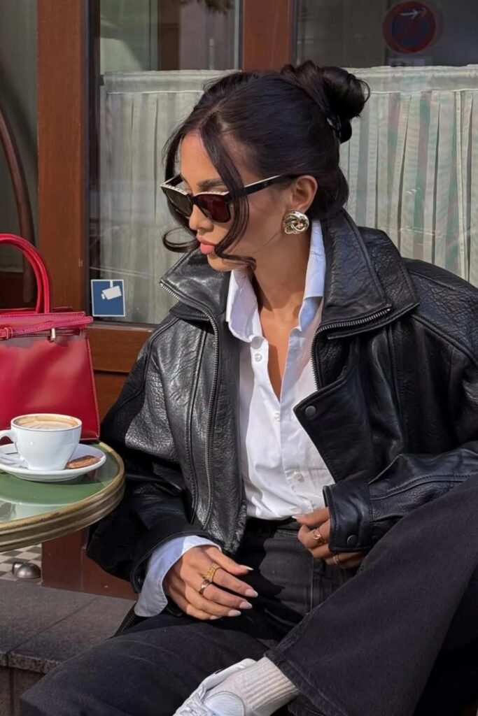 Black Cropped Leather Jacket + White Button-Down Shirt + Black Jeans + Red Handbag