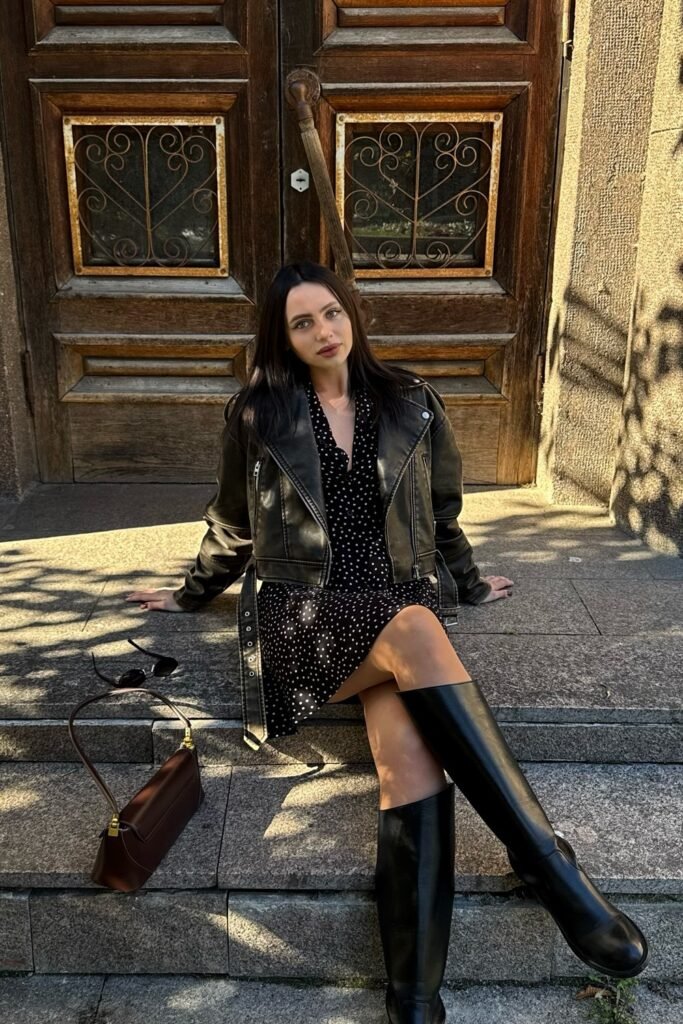 Black Faux Leather Moto Jacket + Black Polka Dot Mini Dress + Black Knee-High Boots