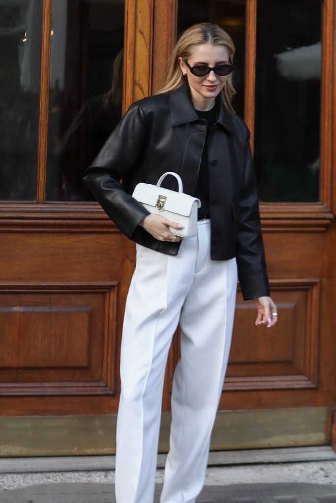 Black Faux Leather Shirt Jacket + Black Top + White Wide-Leg Trousers + White Top-Handle Bag