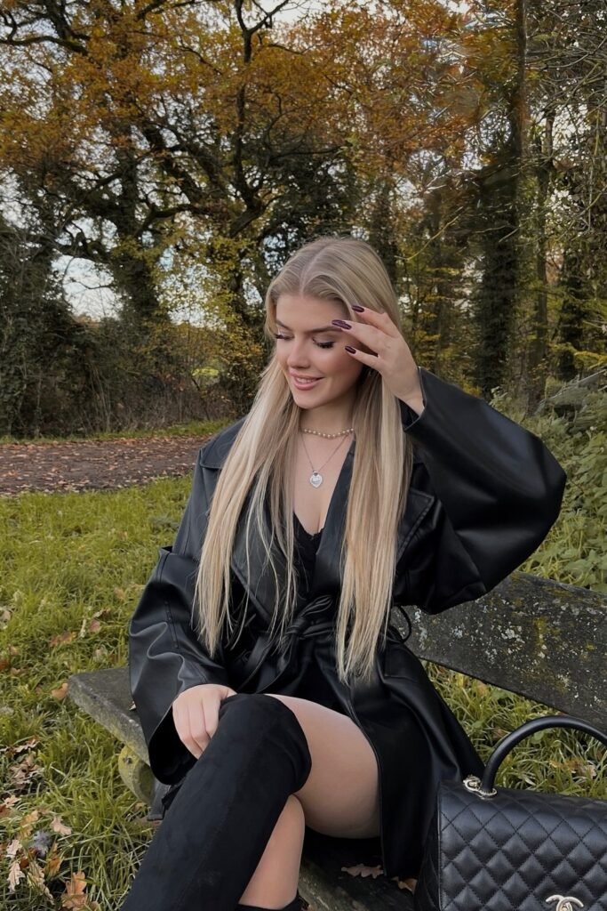 Black Faux Leather Trench Coat (Belted) + Black Over-the-Knee Boots + Quilted Handbag