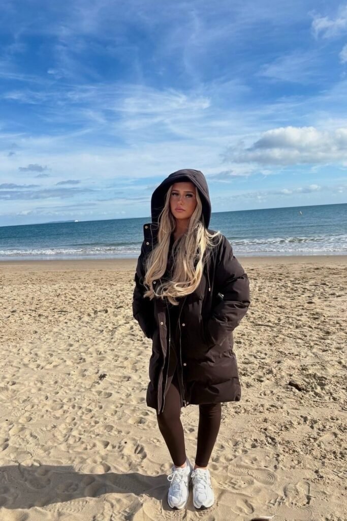 Black Hooded Puffer Coat + Dark Brown Leggings + White Chunky Sneakers