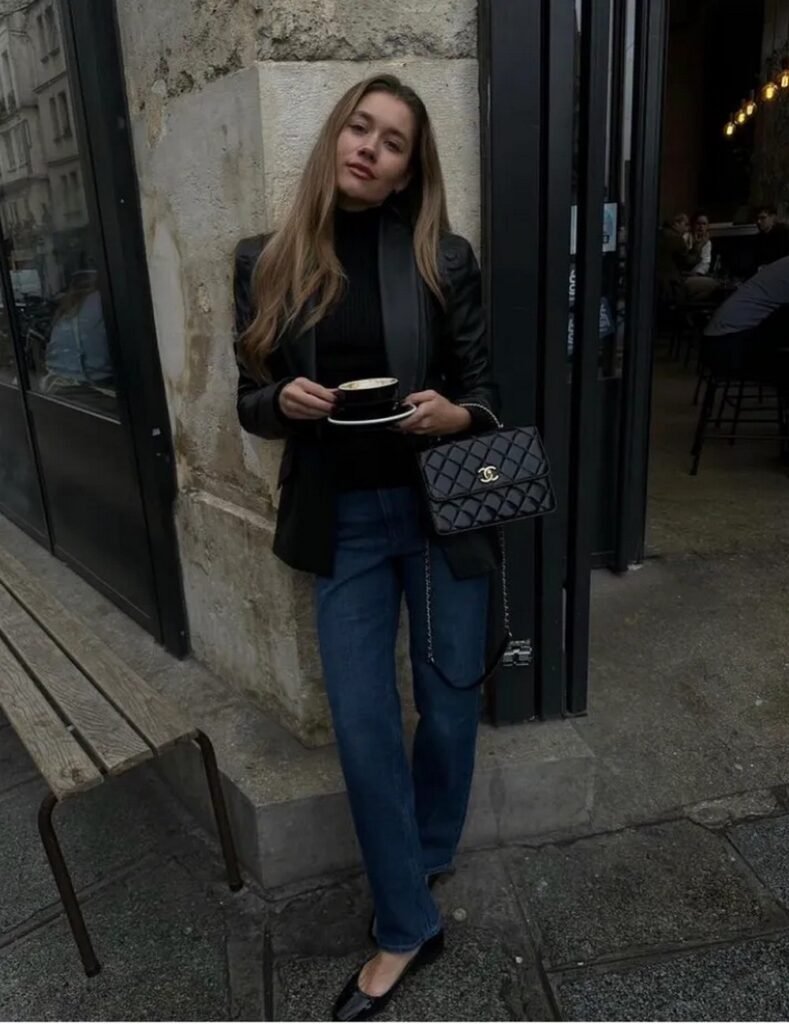 Black Leather Blazer + Black Turtleneck Sweater + Dark Wash Straight Leg Jeans + Black Ballet Flats + Black Quilted Chanel Bag